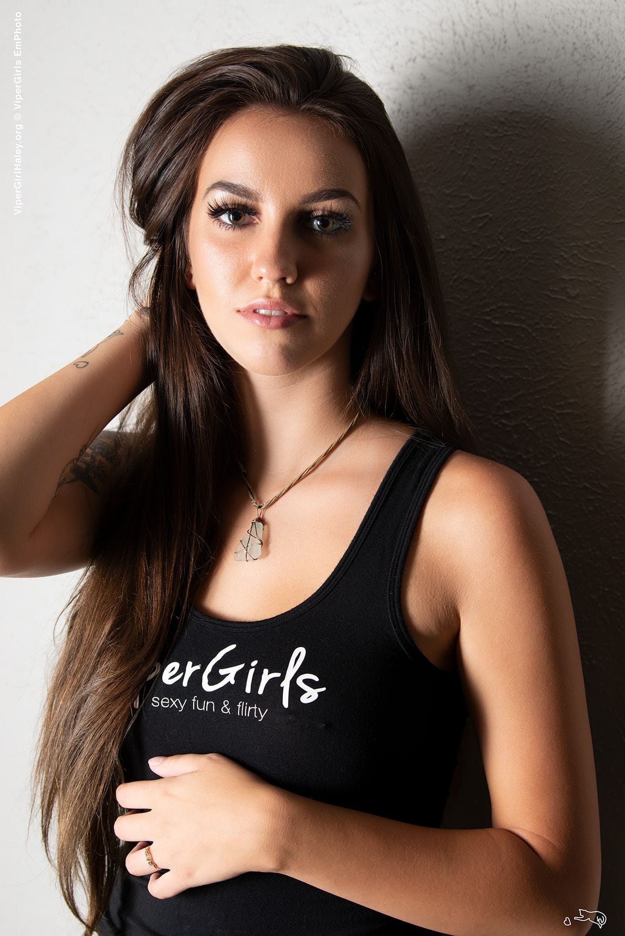 ViperGirl Haley wearing aviperGirls SexyFun and FlirtyTank Top. Brown hair model with Denim jean shorts.ilovevipergirls.com,fiftyshadesofhaley.com, vipergirls.