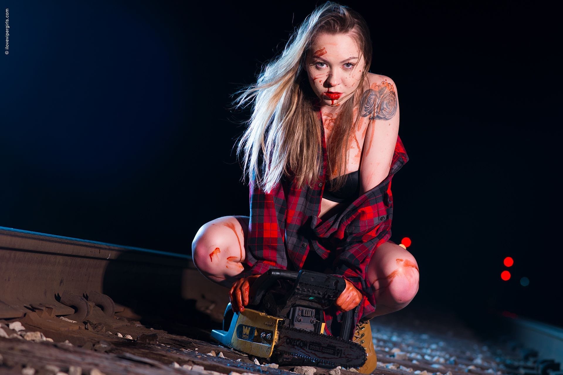 Natalia,ilovevipergirls.comChainsaw series.Spooky series.Blood and Chainsaw.Girlswith chainsaws. Bloodon the tracks. Lingerie, boudoir. SexyFun and Flirty.