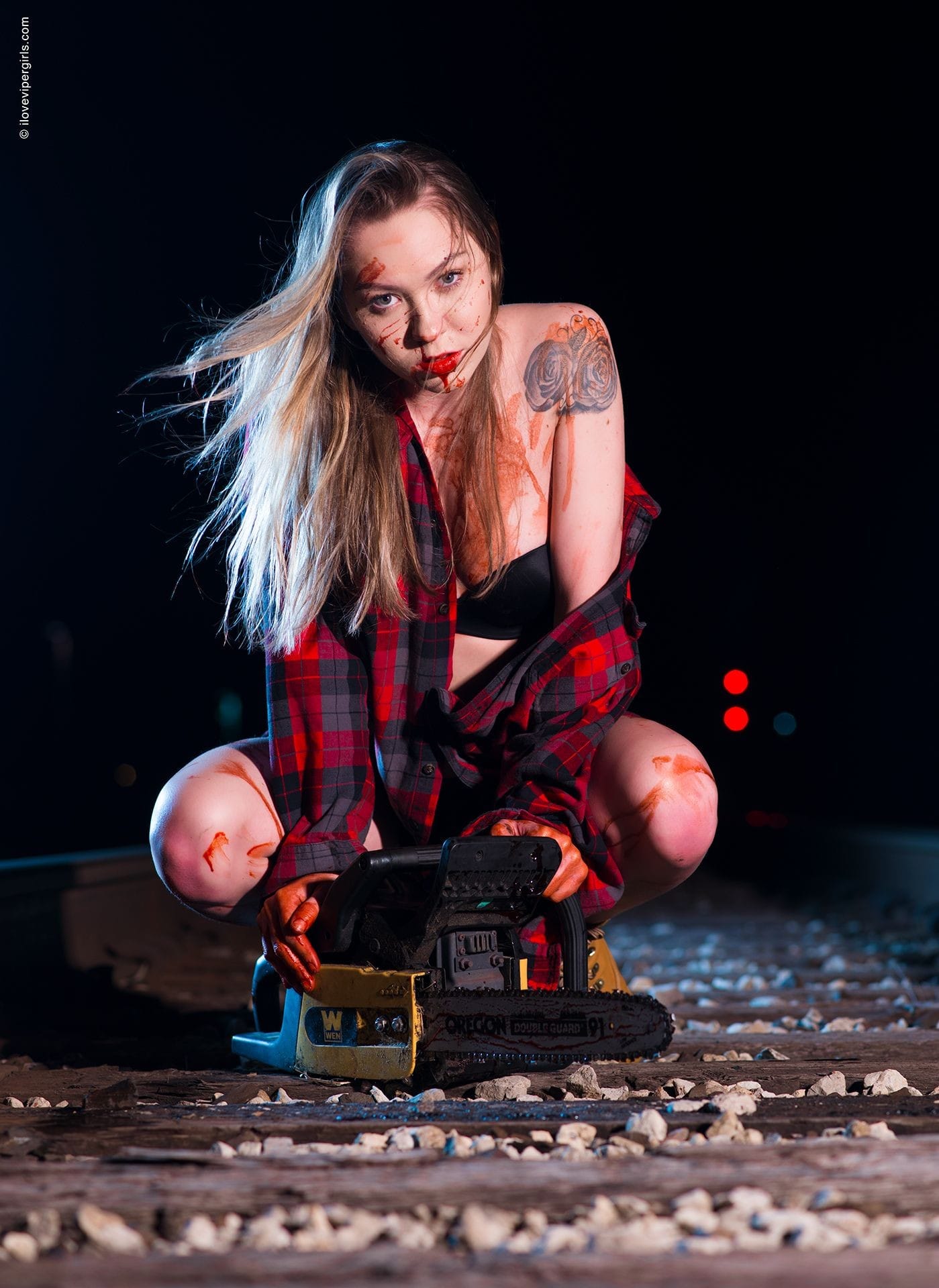 Natalia,ilovevipergirls.comChainsaw series.Spooky series.Blood and Chainsaw.Girlswith chainsaws. Bloodon the tracks. Lingerie, boudoir. SexyFun and Flirty.